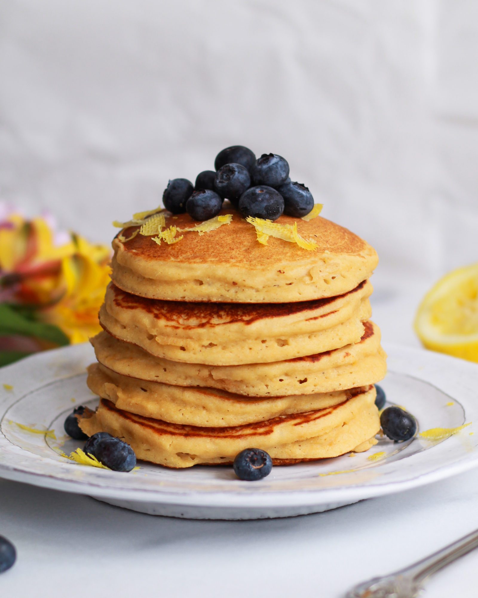 stack of fluffy lemon ricotta pancakes
