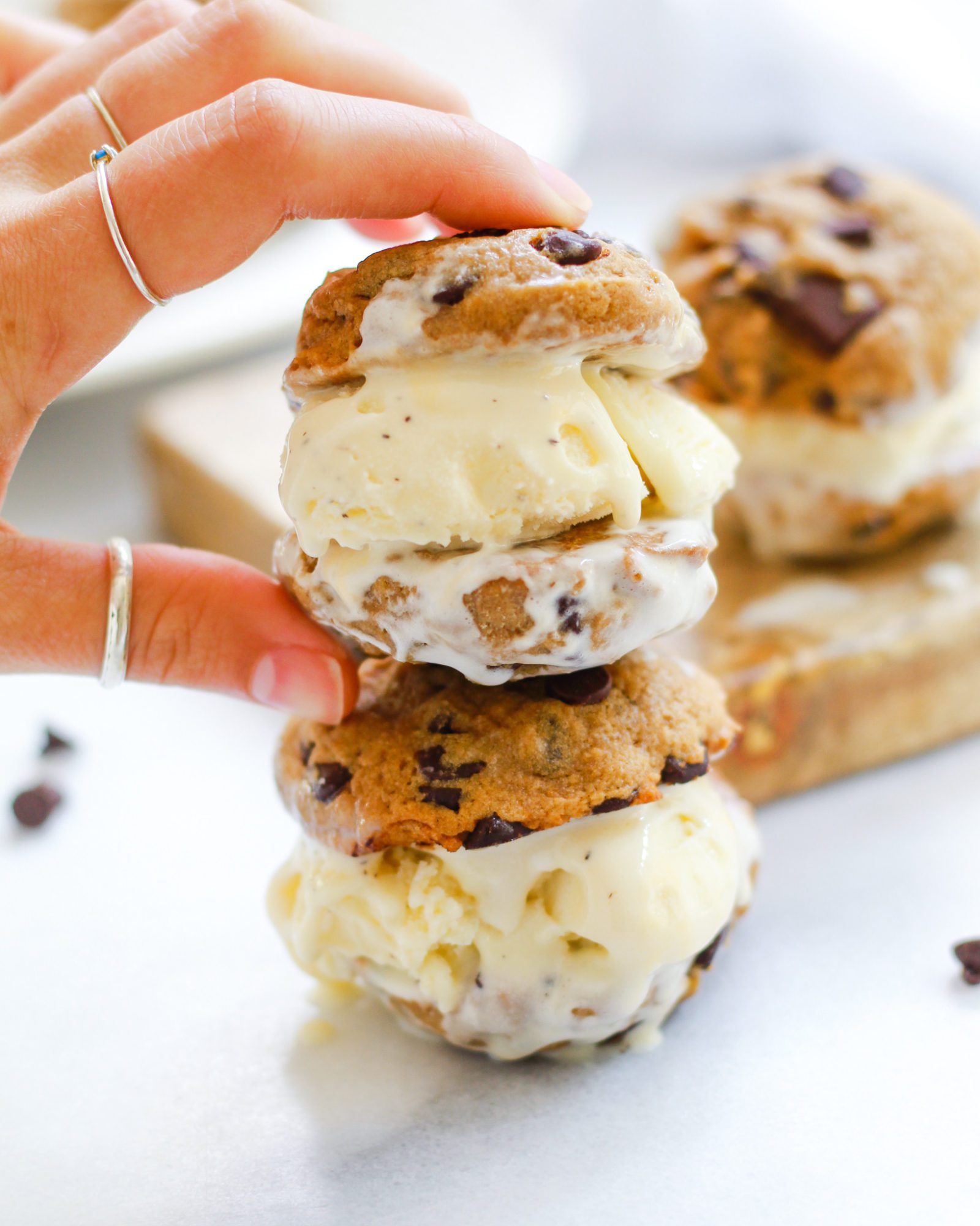 hand holding ice cream sandwiches stacked