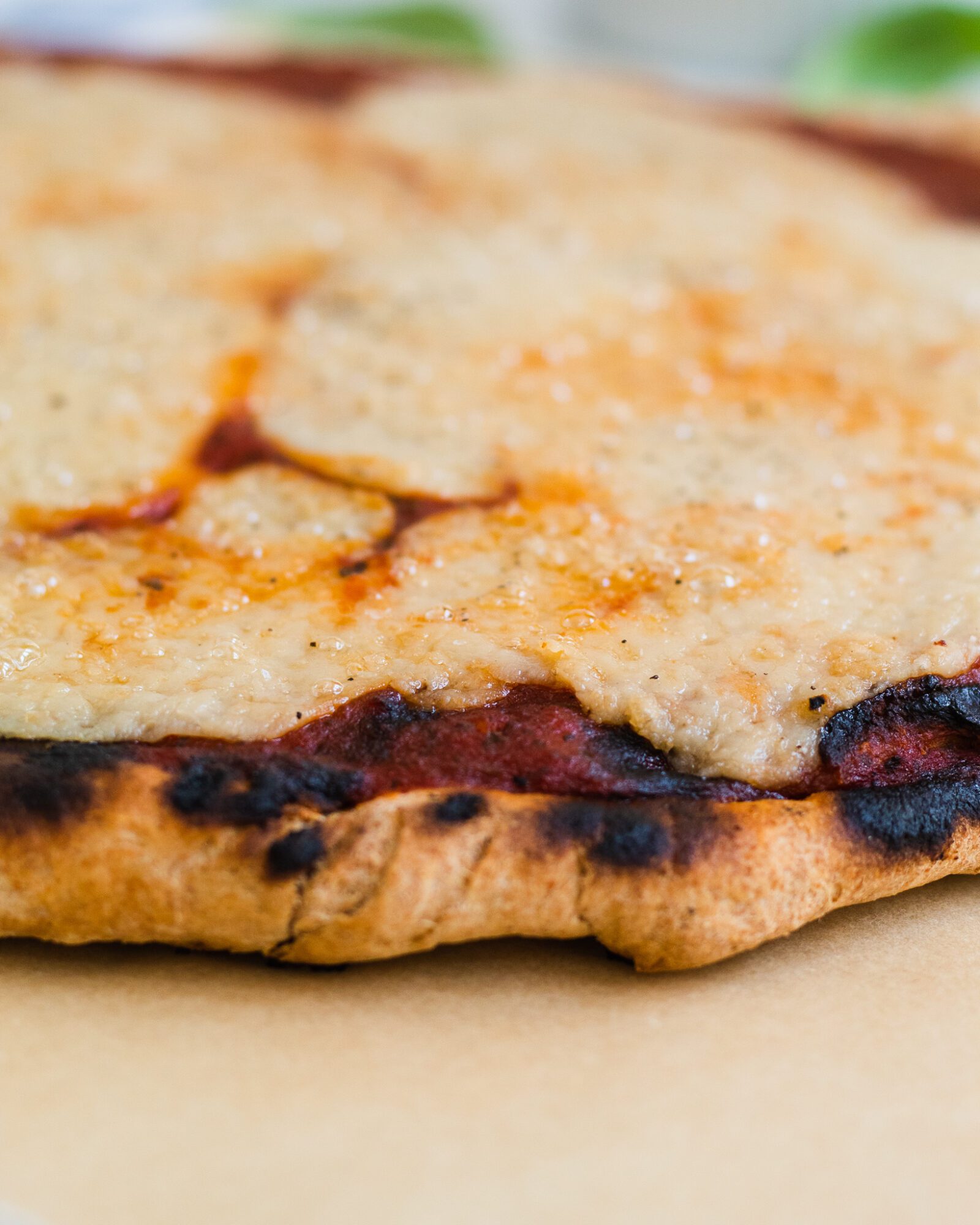 close up of grilled pizza crust
