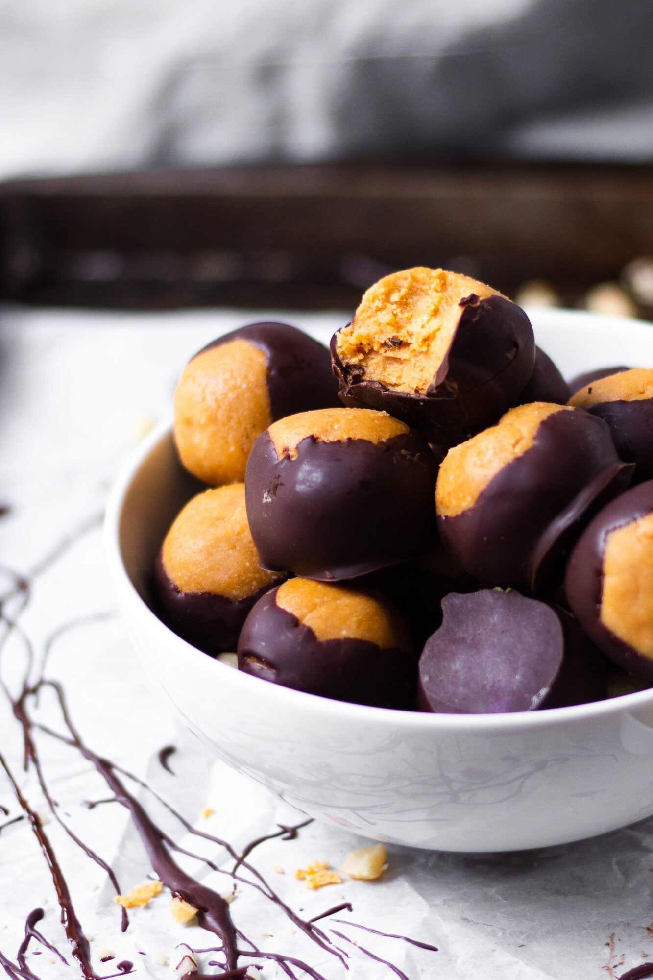 close up of bowl of peanut butter buckeyes