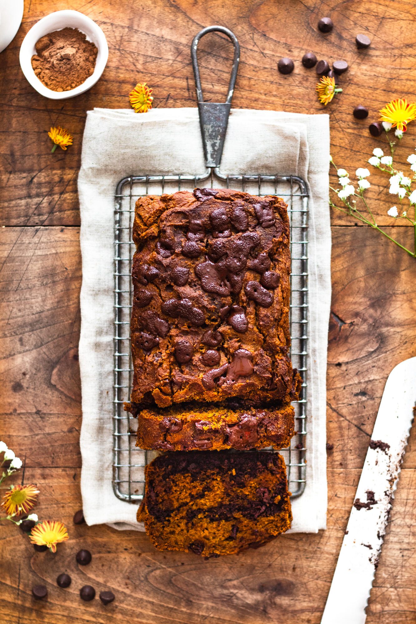 healthy pumpkin bread on cooling rack with cake knife