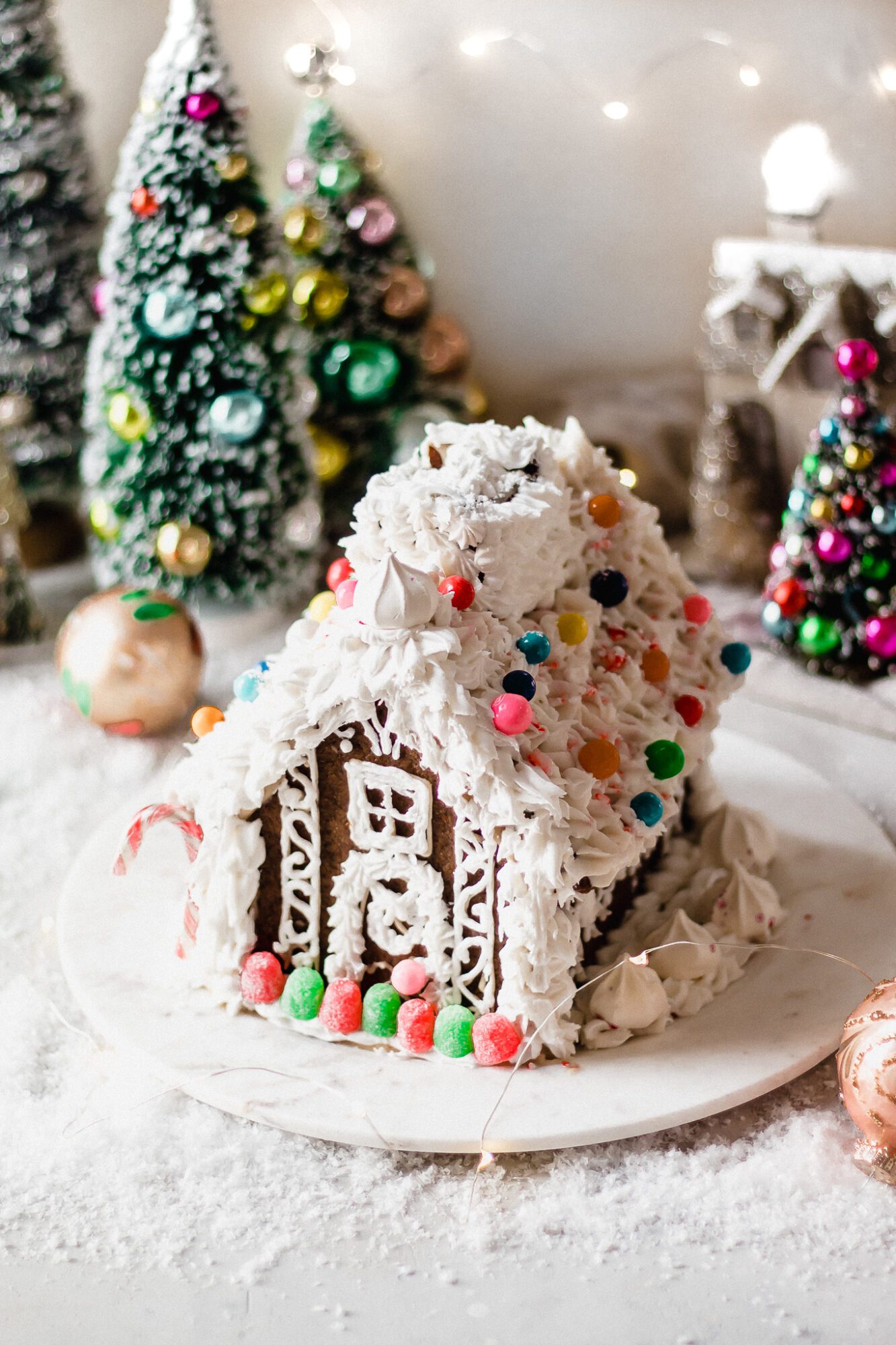 vegan gingerbread house on marble plate