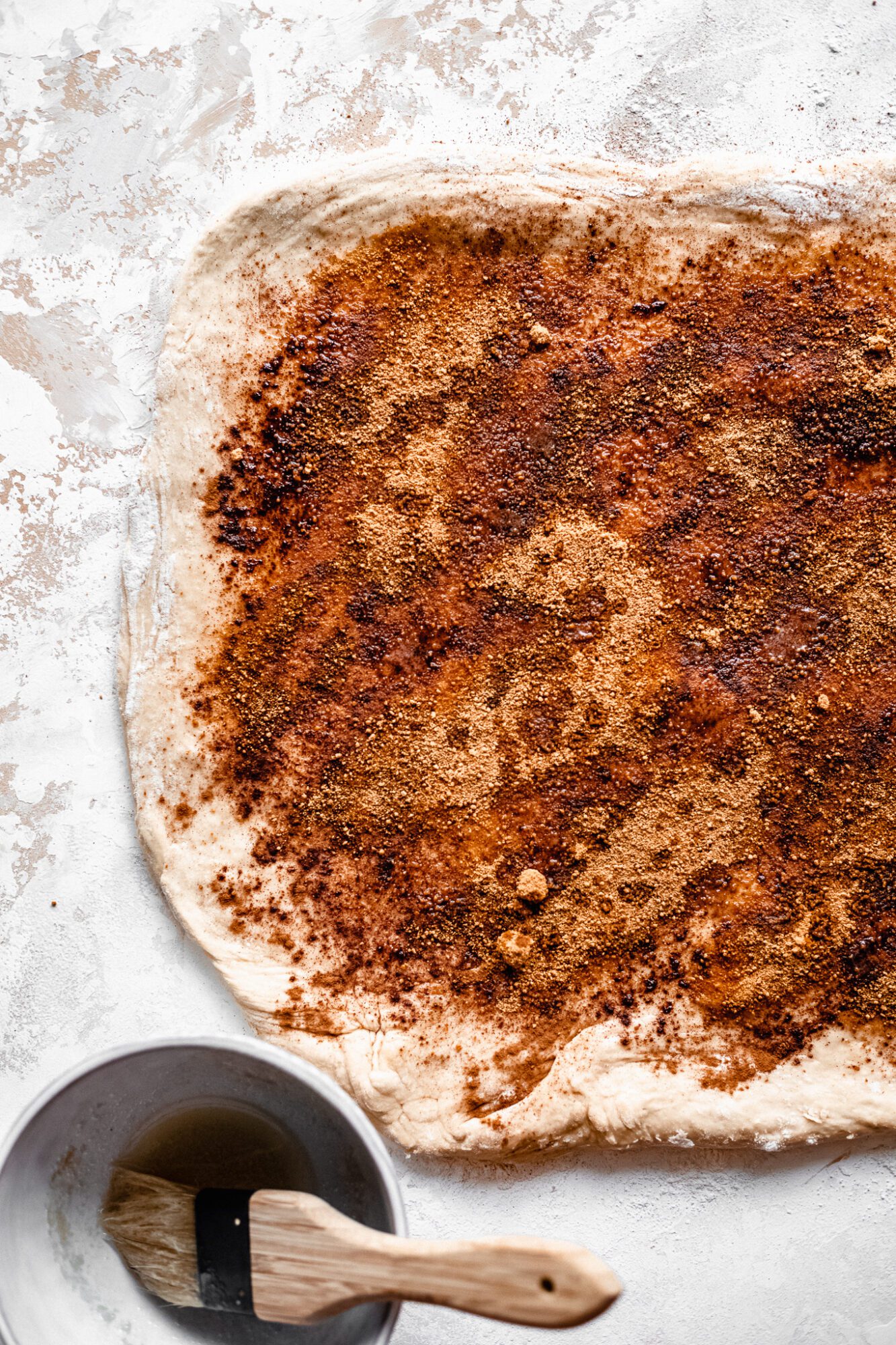 cinnamon roll dough with cinnamon