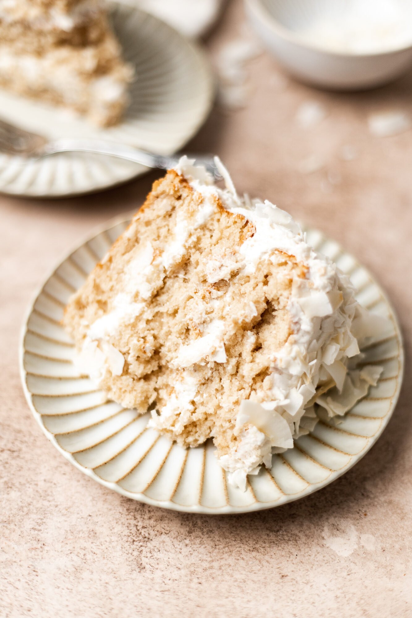 https://thebananadiaries.com/wp-content/uploads/2022/01/vegan-coconut-cake_7953-1333x2000.jpg