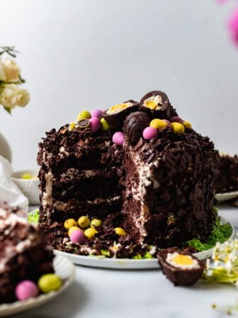 sliced chocolate Easter egg cake on a plate