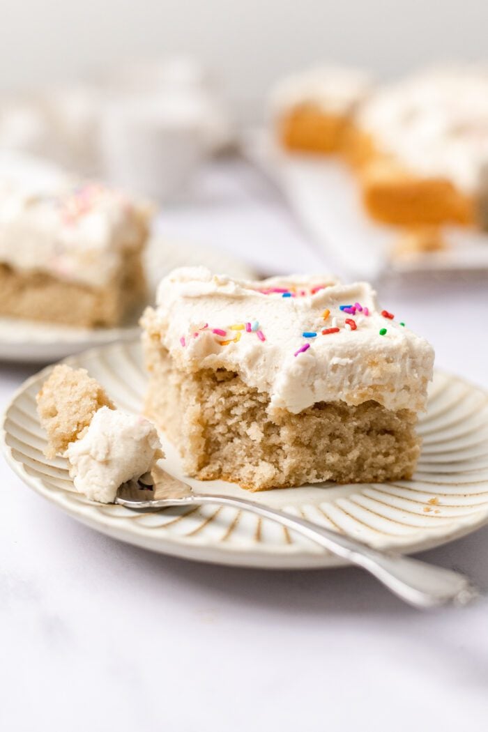 https://thebananadiaries.com/wp-content/uploads/2022/05/vanilla-sheet-cake-recipe_5820-700x1050.jpg