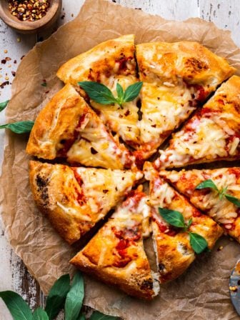 Homemade Quick & Easy Vegan Pizza Recipe (Pizza Dough Recipe + Topping Ideas!) sliced pizza