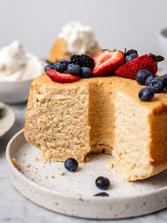 Vegan angel food cake on a plate sliced