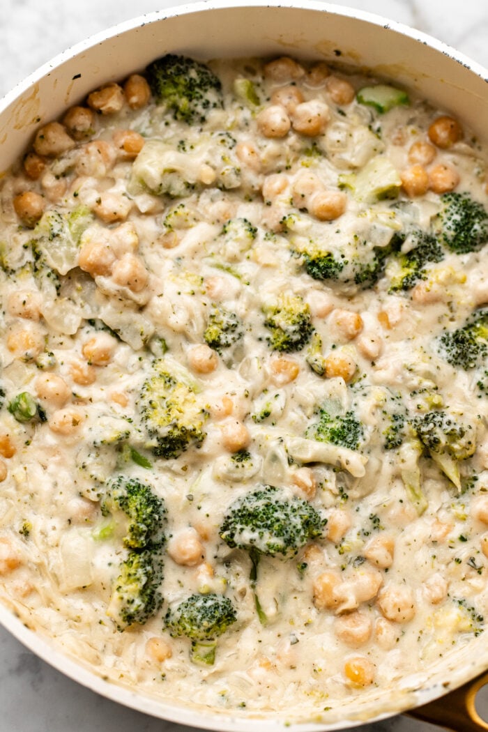 skillet of chickpea broccoli alfredo bake