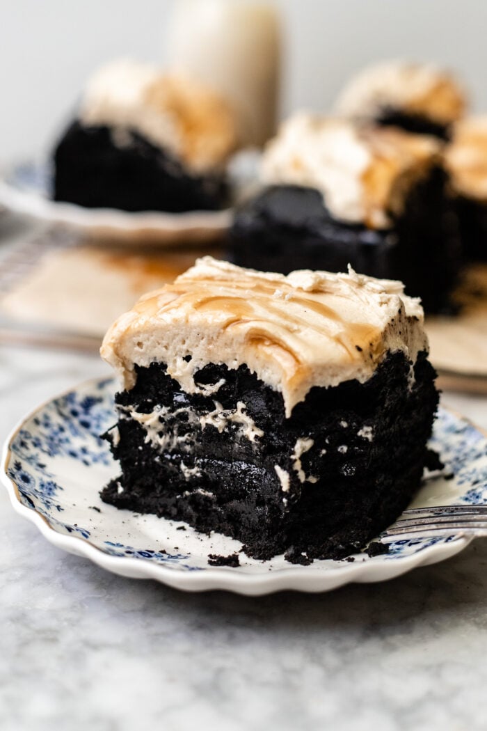 bitten slice of chocolate sticky toffee pudding cake