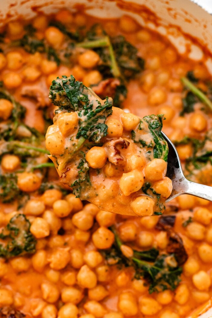 scooped marry me chickpeas in a saucepan