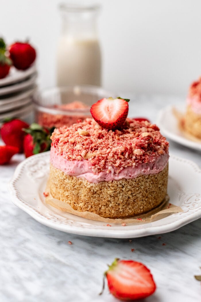 vegan strawberry crunch cheesecake on a plate