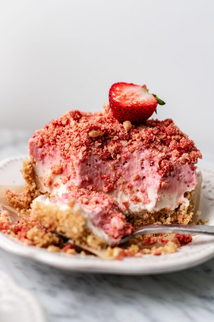 bitten strawberry crunch cheesecake