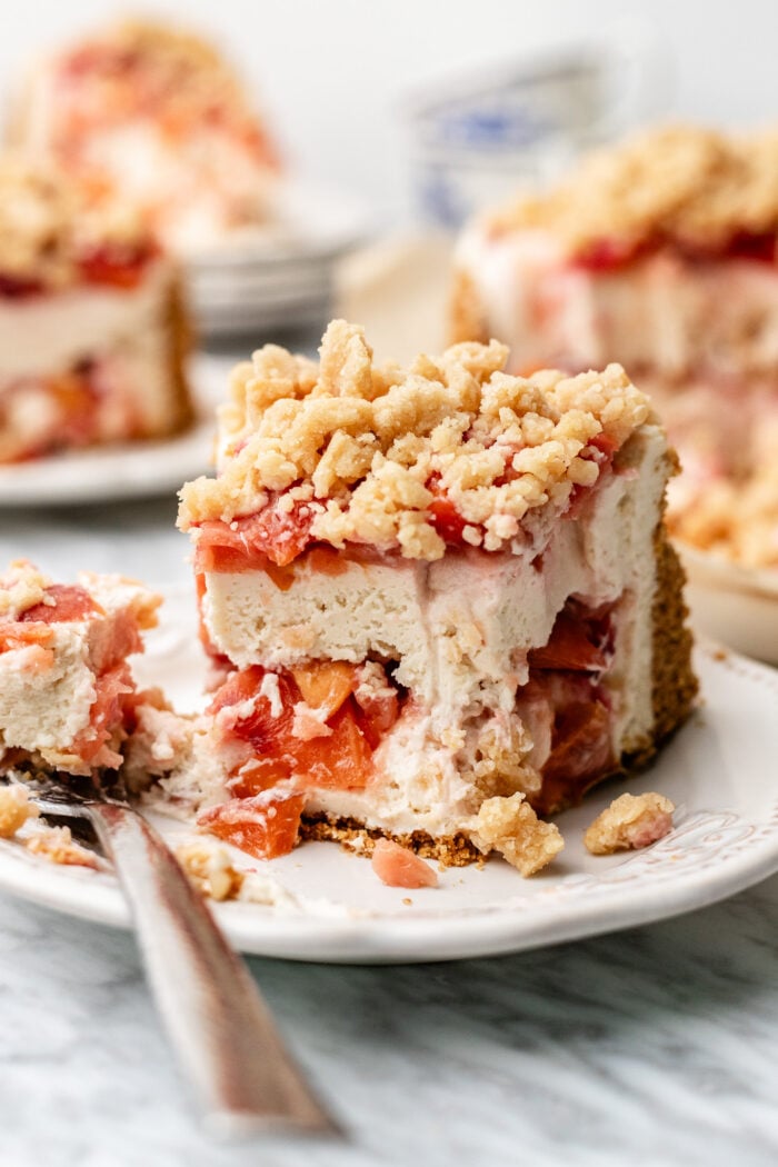 bitten slice of cheesecake