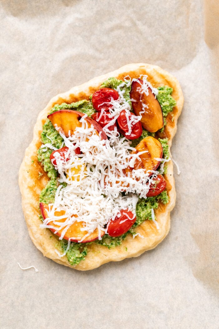 assembling the flatbread pizzas