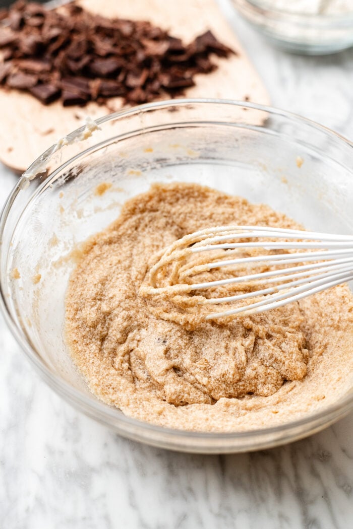 whisking together the ingredients