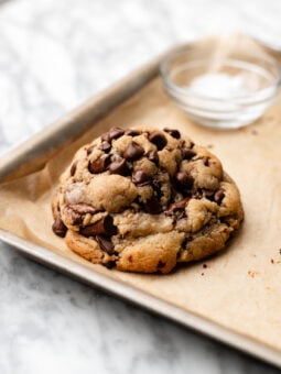 chocolate chip cookie on baking sheet