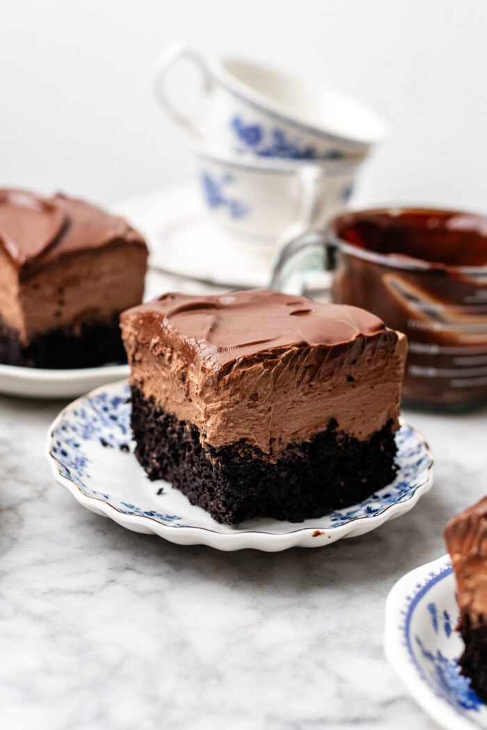 round chocolate mousse cake sliced on a plate
