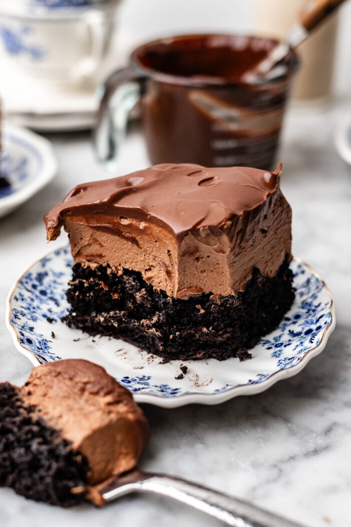 bitten chocolate mousse cake on a plate