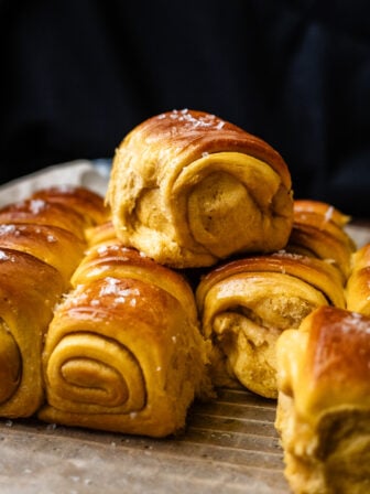 stacked vegan sweet potato Parker house rolls