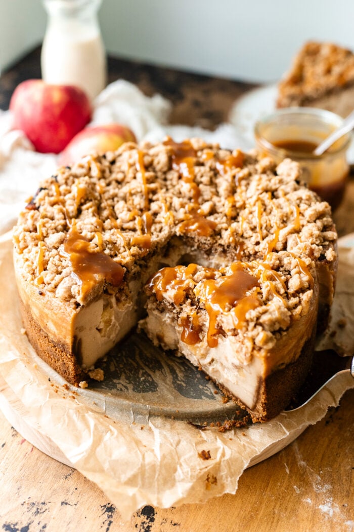 sliced vegan apple crumble cheesecake