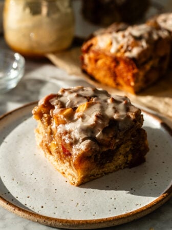 slice of apple fritter cake on a plate