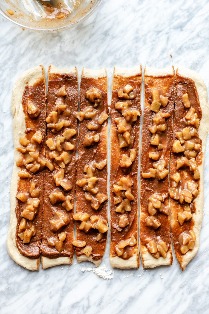 sliced apple pie cinnamon rolls into strips