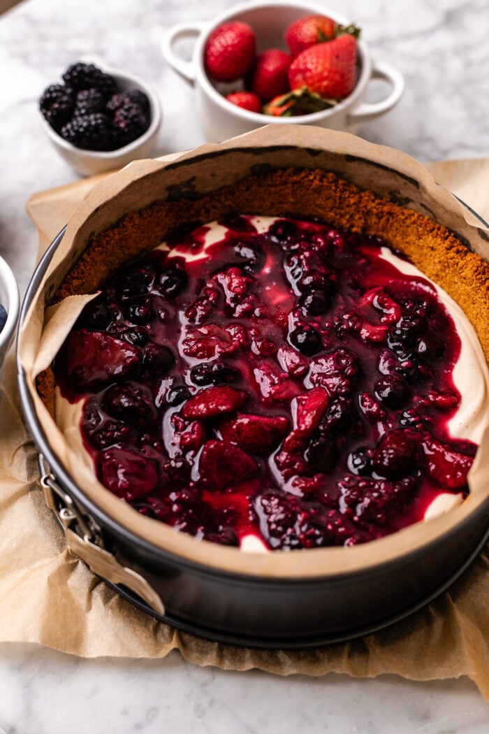 mixed berry compote on cheesecake