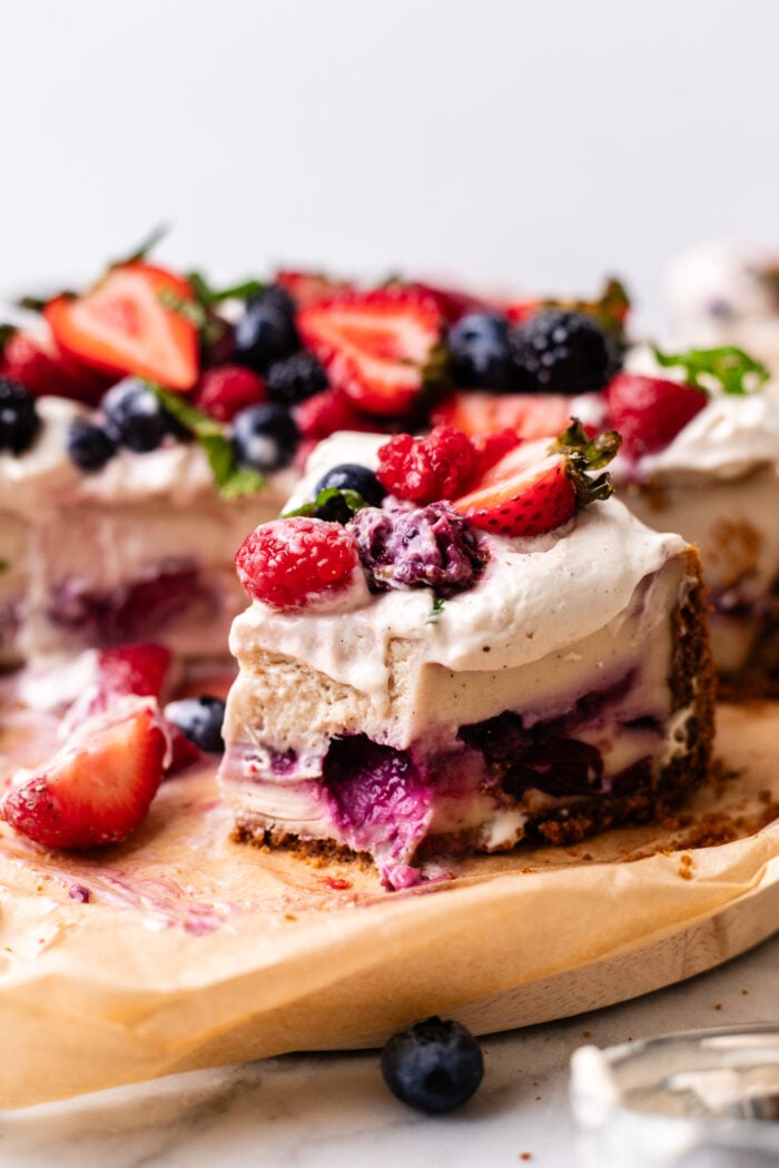 slice of vegan chantilly cheesecake bitten
