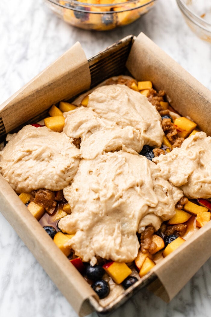 assembling the peach fritter cake