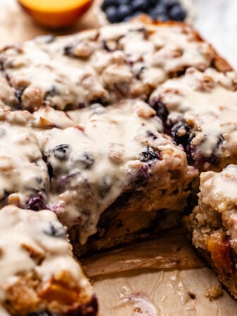 sliced blueberry peach fritter cake