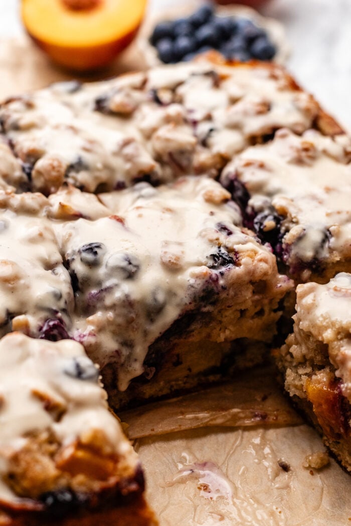sliced blueberry peach fritter cake