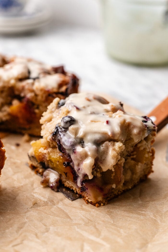 sliced fritter cake on parchment paper