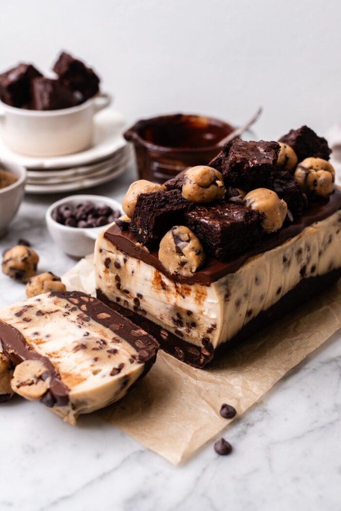 sliced small batch vegan brookie cheesecake