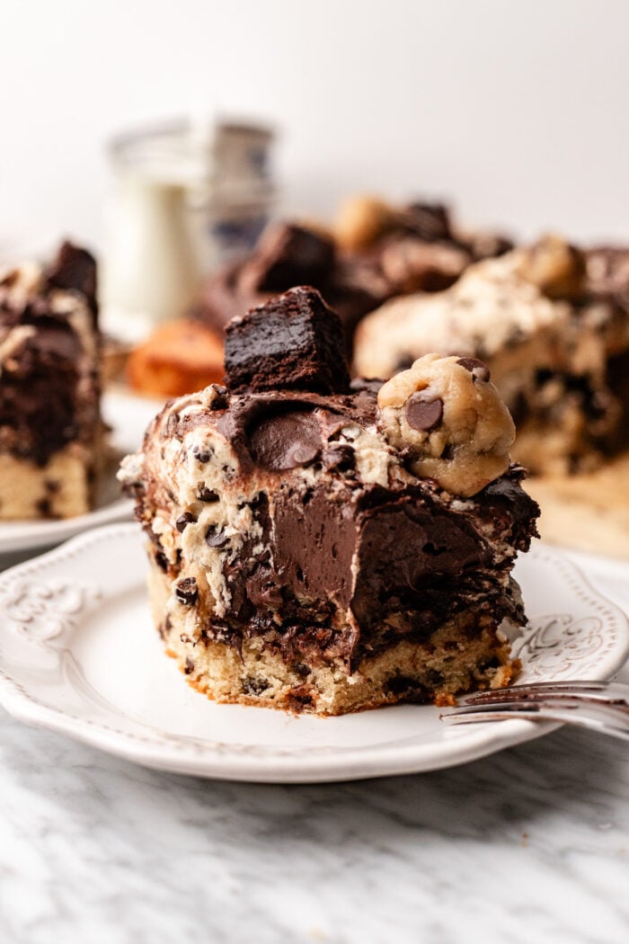bitten slice of cookie dough brownie cake