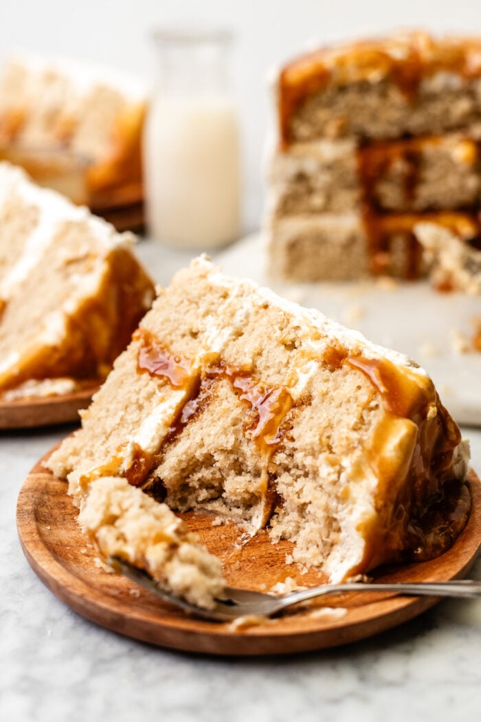 bitten slice of caramel cake