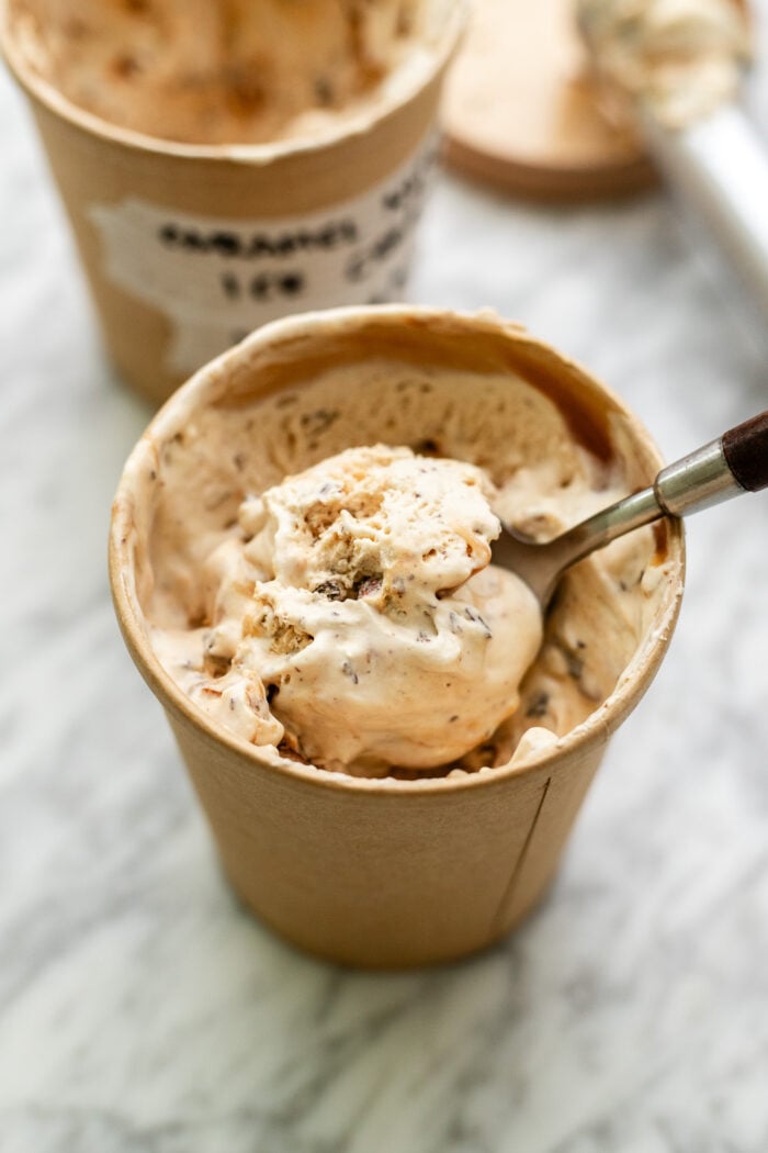 scooping the vegan caramel ice cream from the pint