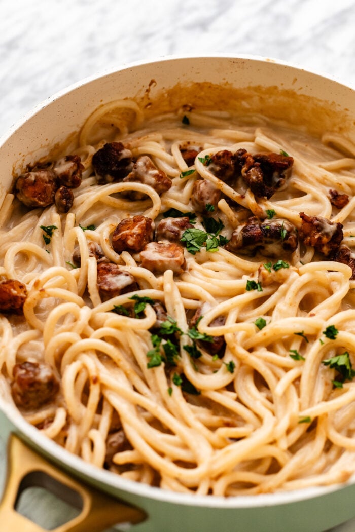 close up of carbonara pasta in a sauce pan