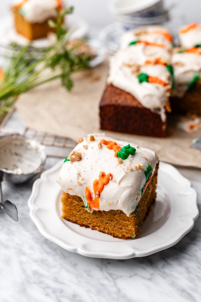 sliced vegan carrot cake on a plate