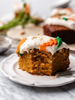 slices of bitten carrot cake on a plate