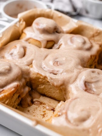vegan chai cinnamon rolls in baking pan