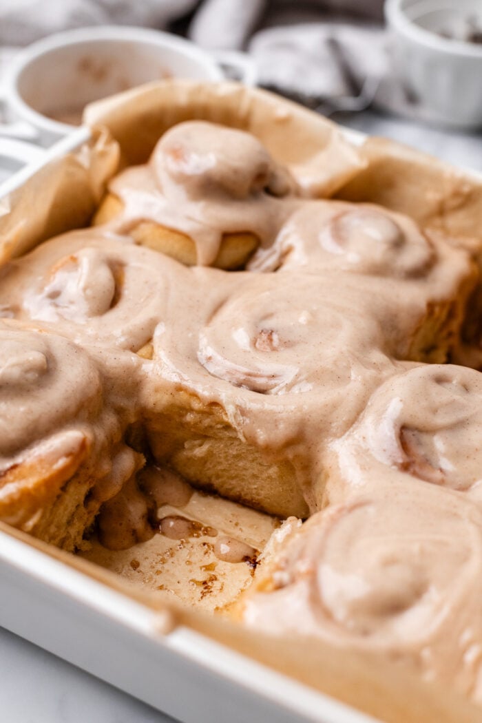 vegan chai cinnamon rolls in baking pan