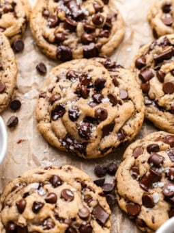 vegan chocolate chip cookies on parchment paper
