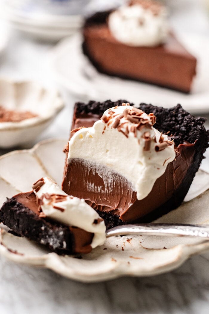 slice of bitten chocolate cream pie