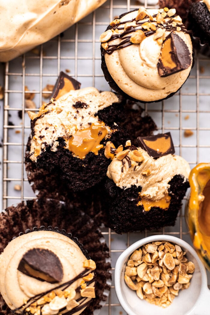 sliced open vegan chocolate peanut butter cupcakes
