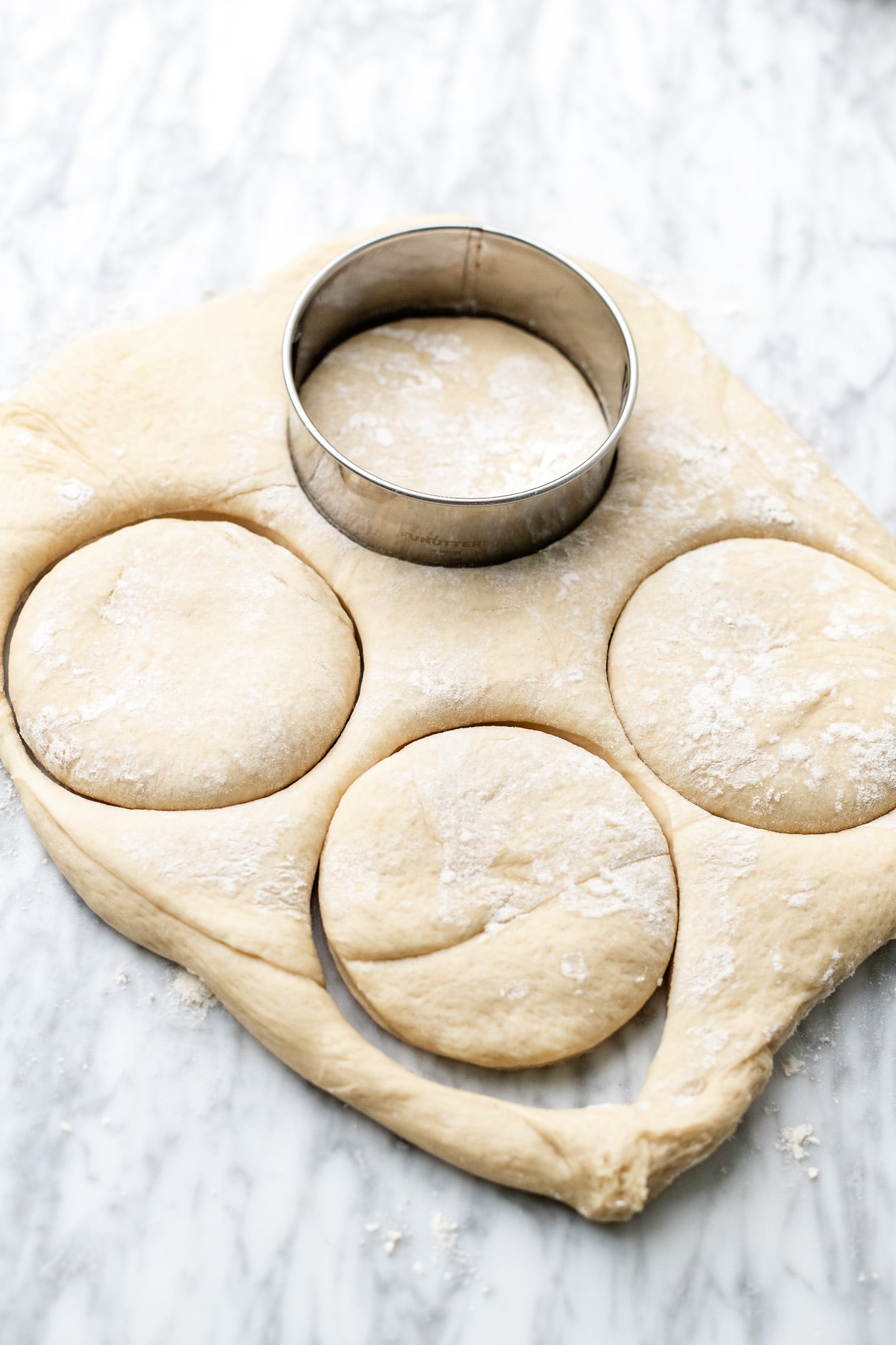 shaping the doughnuts