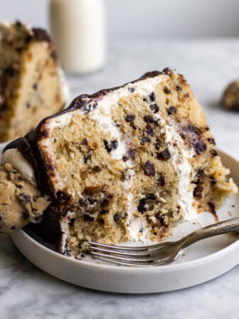 MOIST Vegan Cookie Dough Cake with 'Cream Cheese' Cookie Dough Frosting slice on a plate