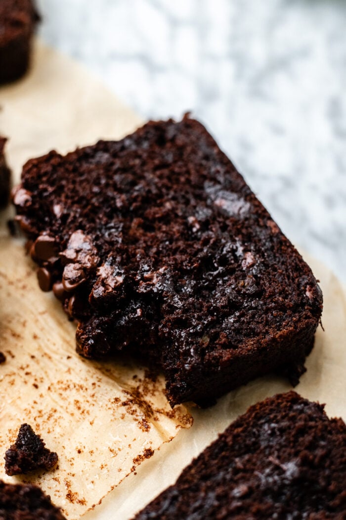 bitten slice of chocolate banana bread