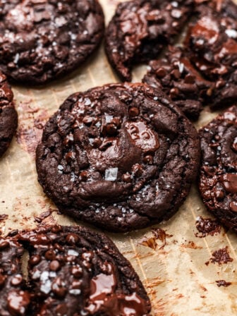 Easy Vegan Double Chocolate Chip Cookies on parchment paper