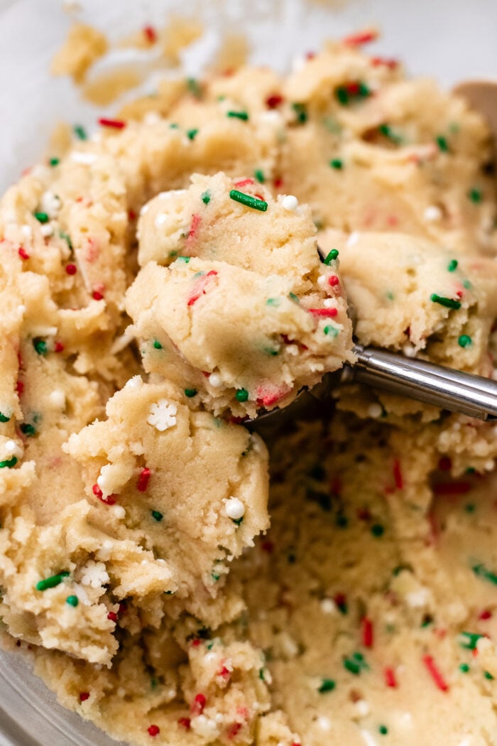 scooping the sugar cookie dough